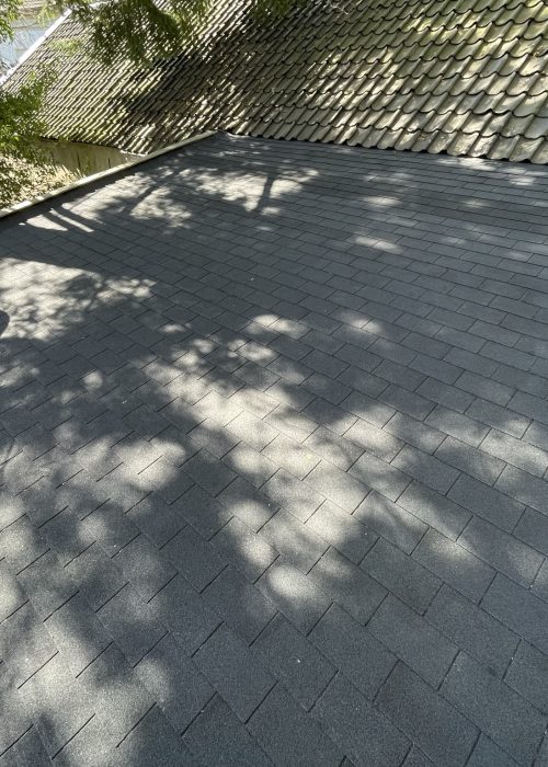 Plat dak vervangen